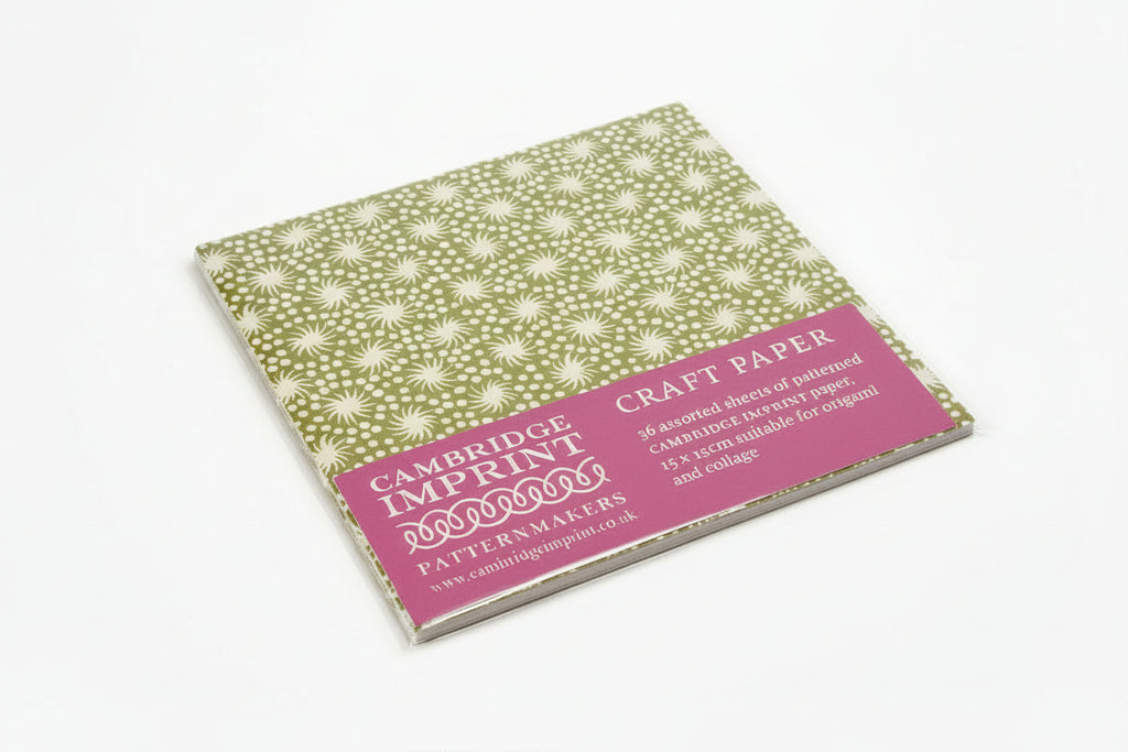 A pack of Cambridge Imprint craft paper with a green floral pattern, labeled as containing 16 assorted sheets, suitable for origami and collage.